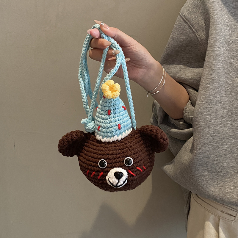 Bolsa de accesorios para niños tejidos de lana hechos a mano adorable oso pequeño bolso de cambio de bebé otoño y invierno nuevo mini mochila