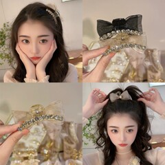 韓国版の軽くて豪華な春夏の蝶結びの前髪はダイヤモンドの女性を挟んでネットの糸を挟みます。