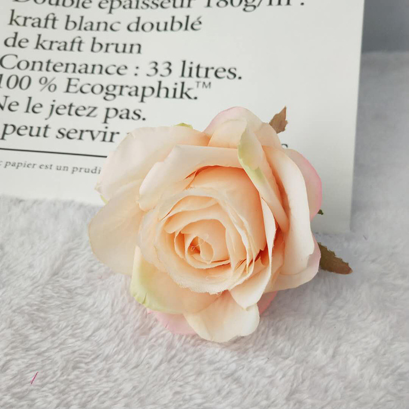 Fábrica directa de simulación de bordes de rosas de seda europea pequeños accesorios de disparo de artículos de boda