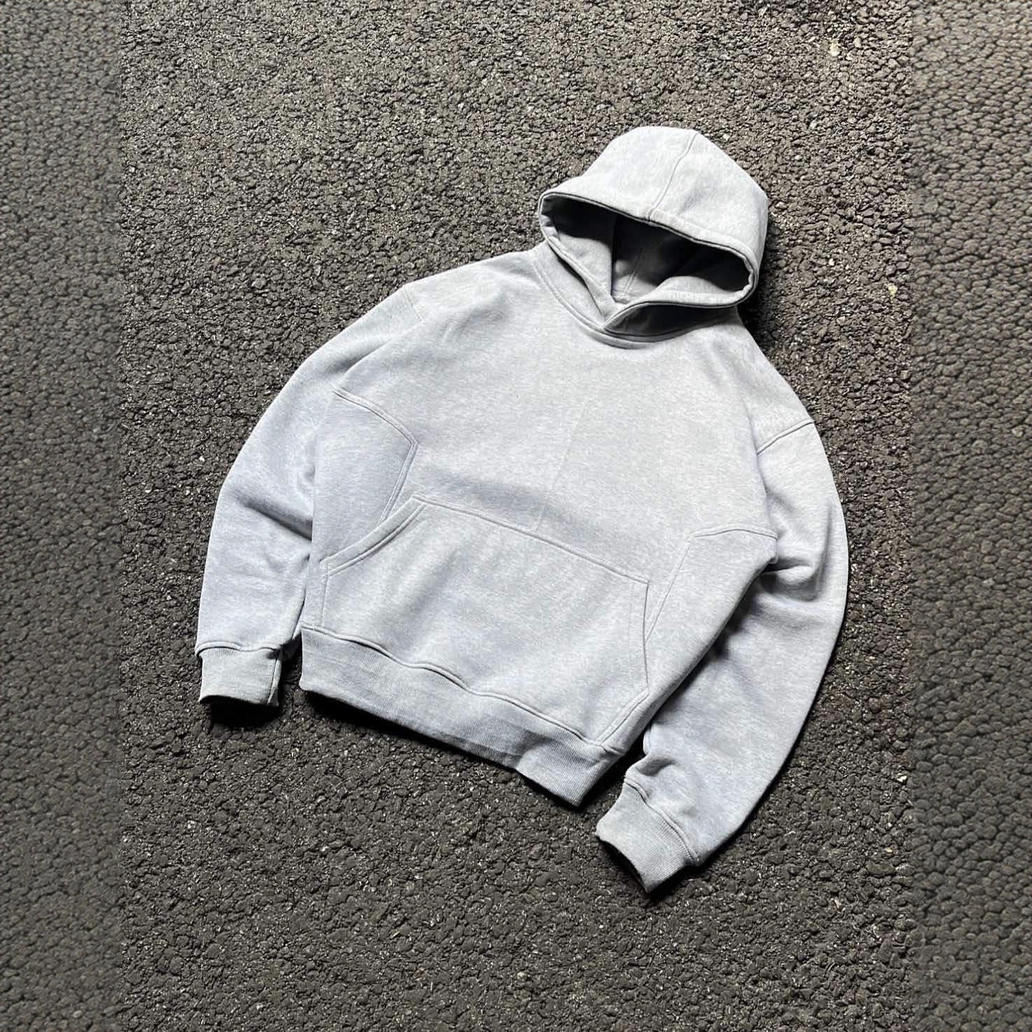 Trajes deportivos de ocio de otoño y invierno transfronterizos American Hooded Sweaters grises sueltos pantalones de piernas anchas pantalones multifuncionales para hombres