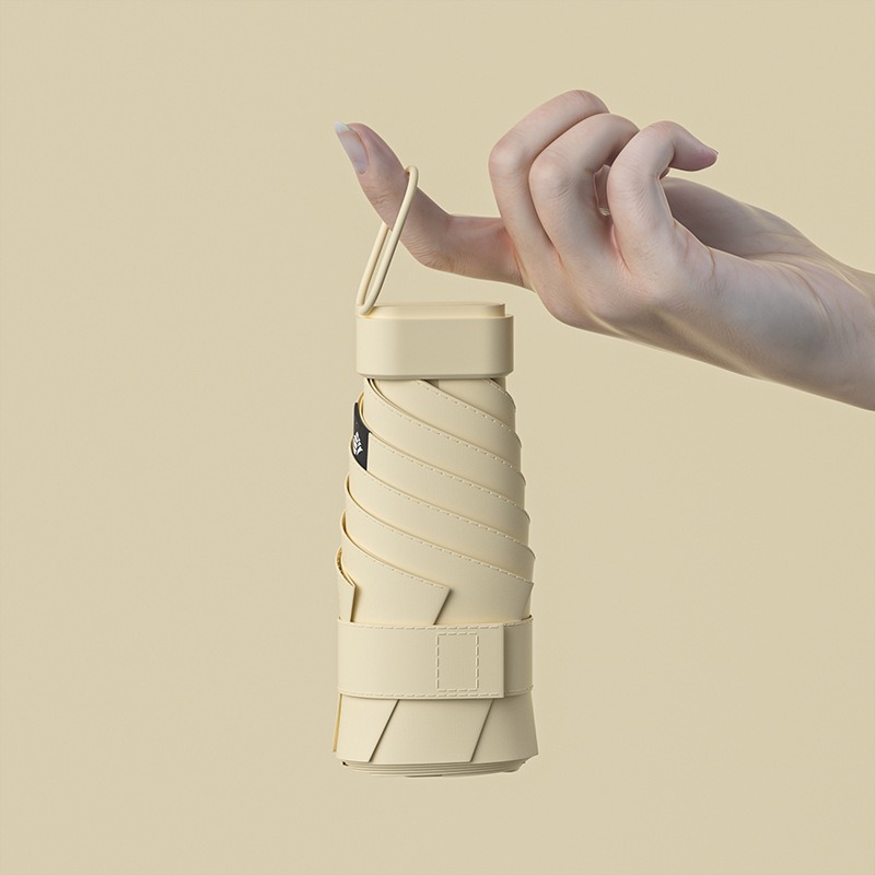 Paraguas de protección solar de vinilo creativo mini paraguas de seis pliegues paraguas de cápsula de bolsillo pequeño para mujer lluvia y lluvia paraguas de sol de doble uso