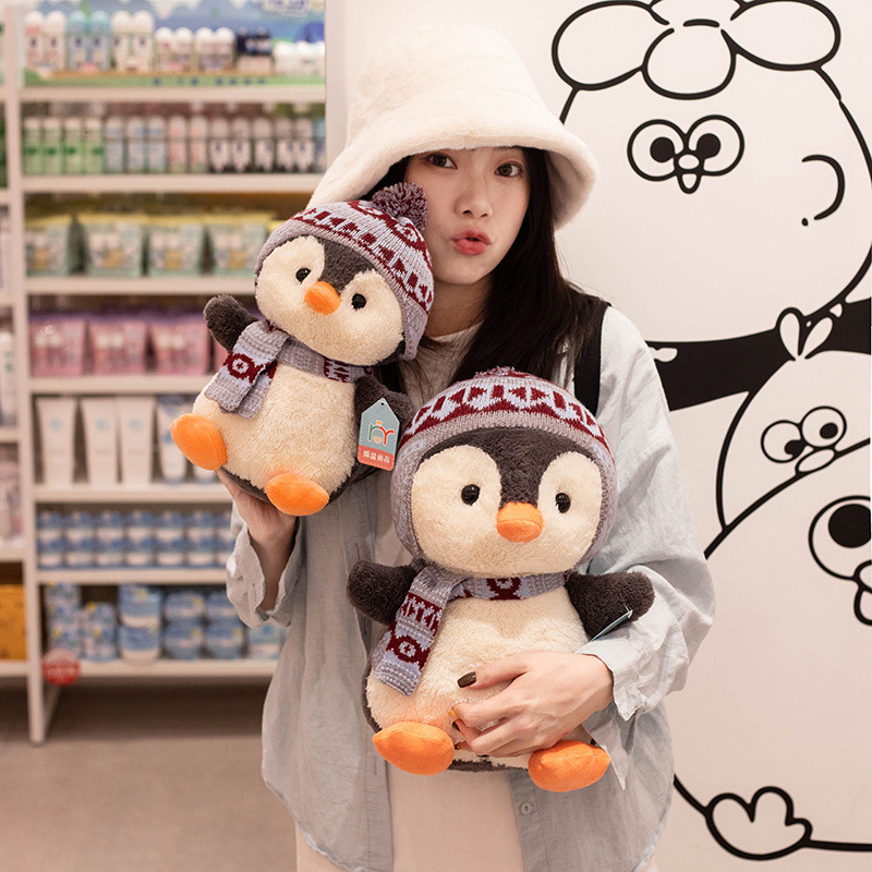 Nuevo creativo lindo invierno muñeca pingüino mochila muñeca de dibujos animados pingüino muñeca de niños almohada agarrar muñeca lote