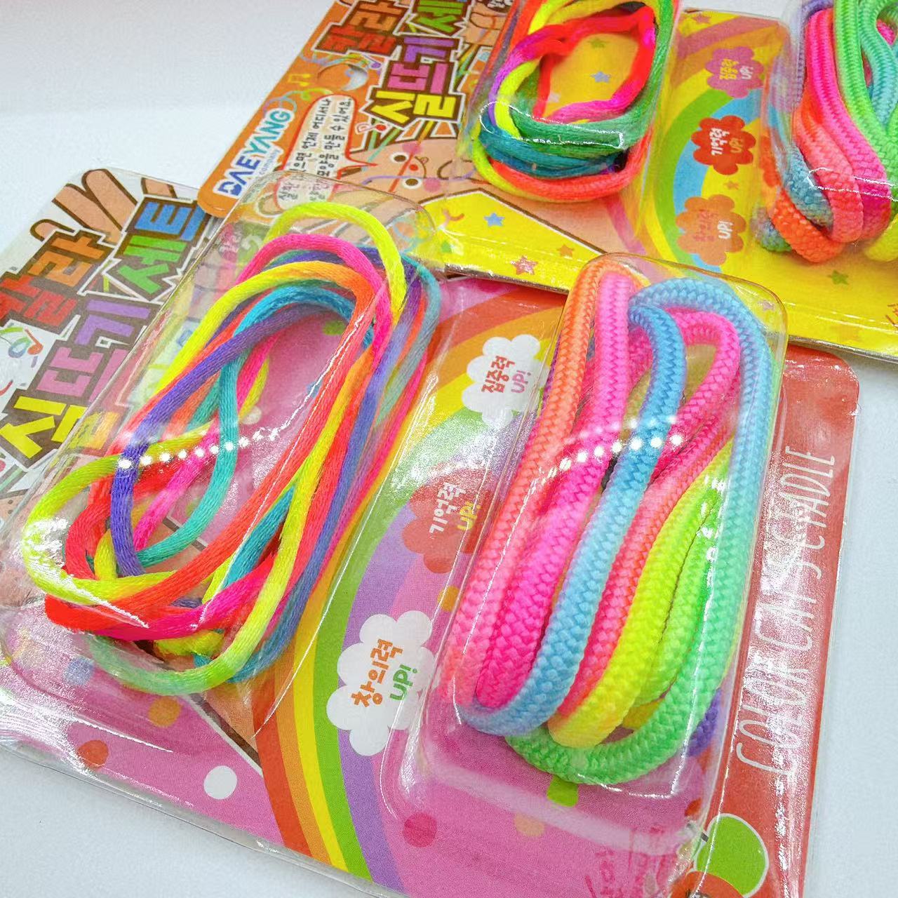 Cuerdas de floración creativas 8090 recuerdos de la infancia nostálgicos lindos juguetes interactivos de reducción de presión cuerda de arco iris para niños