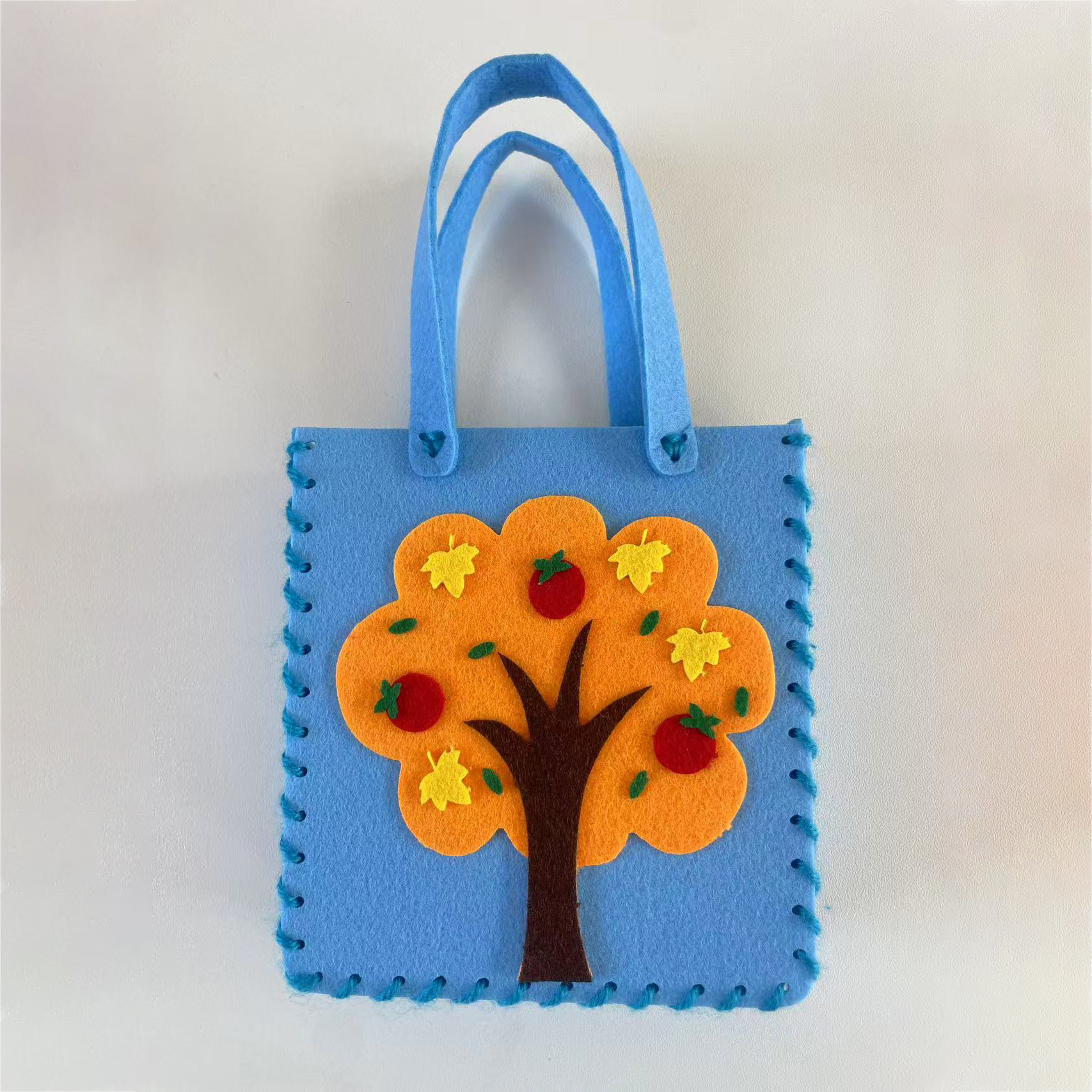 Jardín de infantes bolsas hechas a mano DIY bolsas de tela no tejida material de hacer juguetes creativos para niñas al por mayor