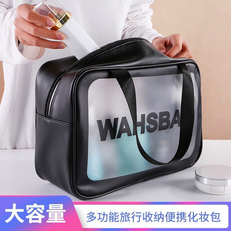 Capacious handheld cosmetic bag