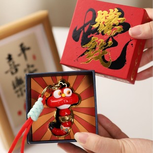 Cross-border foreign trade money snake exquisite gift box packaging 2025 snake hand new key chain car hanging turn pendant wholesale