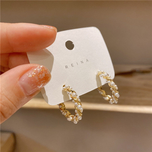Korean style Dongdaemun temperament pearl earrings S925 silver needle ladylike temperament fashion small fresh spiral round earrings