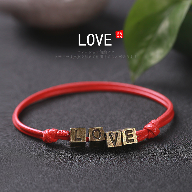 Pulsera tejida a mano – motivos trébole/póker, estilo unisex vintage