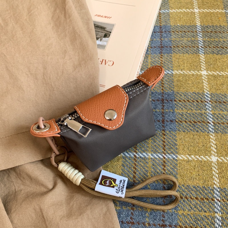 Moda coreana de almacenamiento bolsillos de cambio nuevo bolso portátil auricular bolso lindo mini 2026 bolso de lápiz labial para mujeres