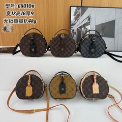 Lujiaの新しい女性用小型ラウンドバッグ、高見えするポータブルクロスボディバッグ、軽くて豪華なレディースバッグ、ファッショナブルなレプリカ、工場直販
