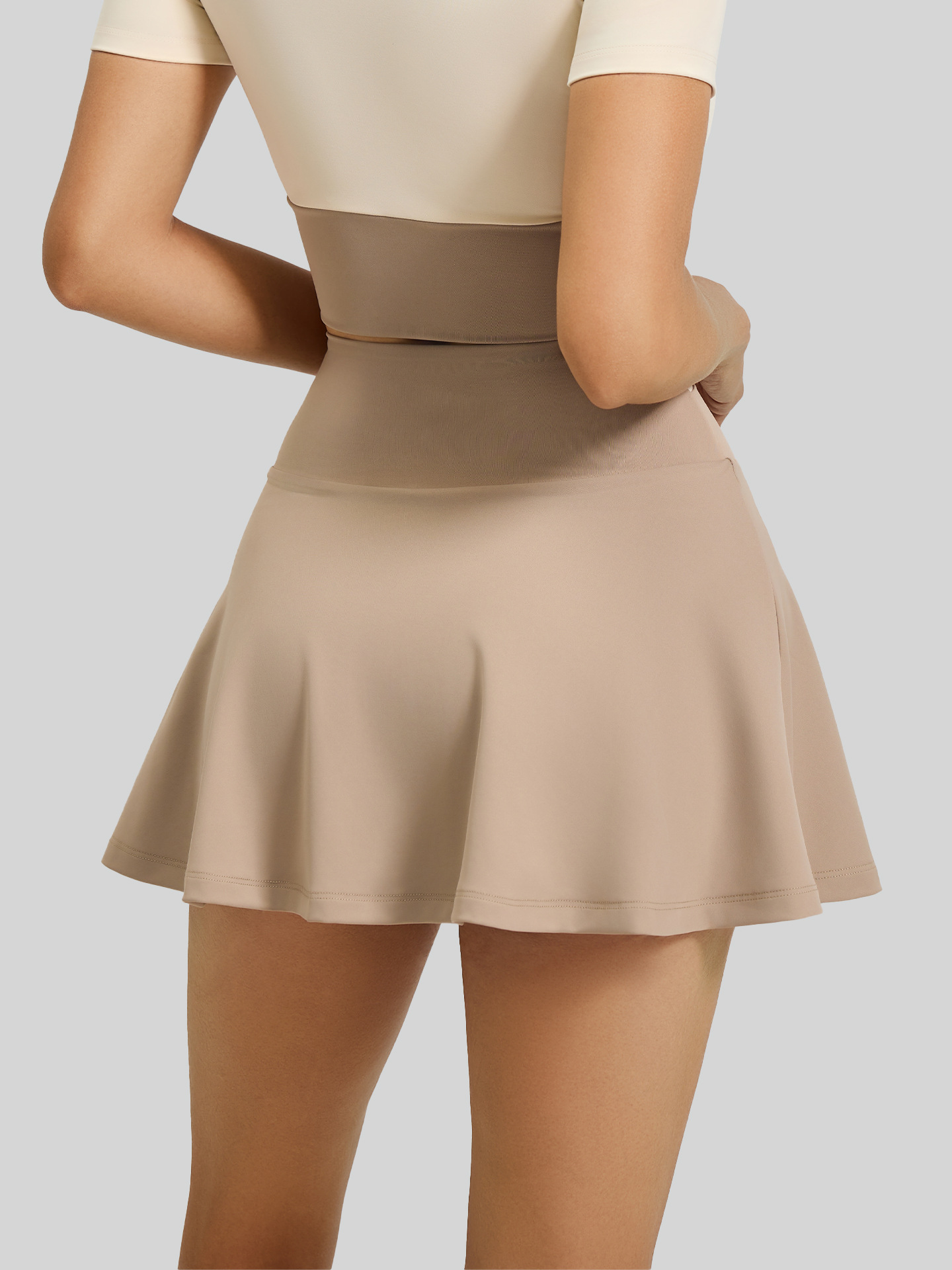 Juyitang falda deportiva desnuda bloqueada de color antiexposición falsa de dos piezas para correr fitness yoga falda para mujer