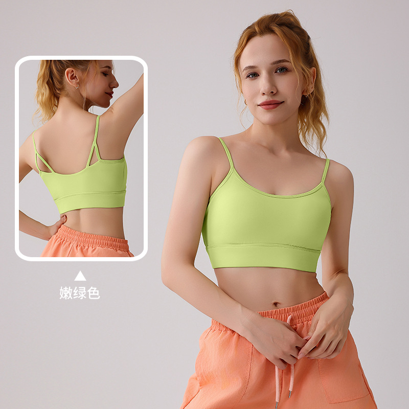 Nueva ropa interior deportiva integrada correa de hombro delgada fija taza antichoque se reúne delgada secado rápido hermoso sostén de yoga de verano