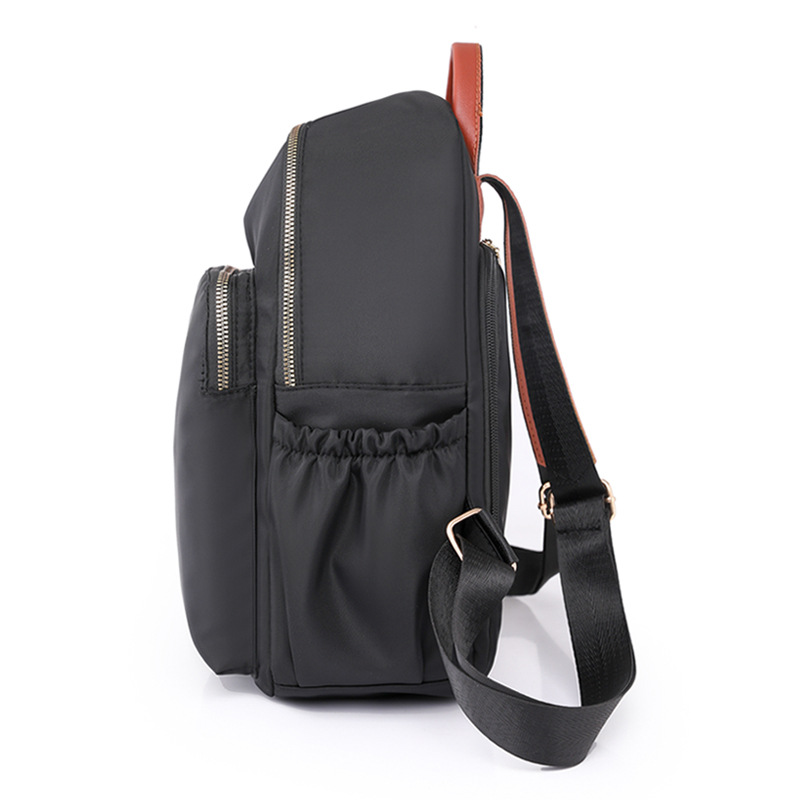 2023 nueva mochila casual para mujer de nailon moda salvaje viaje urbano mochila pequeña mochila escolar ligera al por mayor