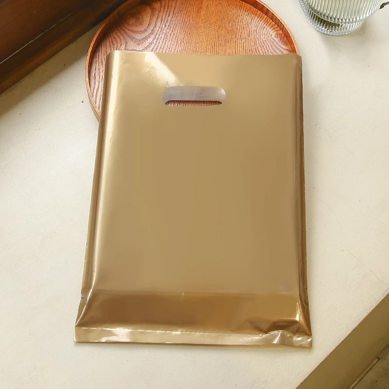 Bolsa de mano de tienda de ropa de grosor, bolsa de embalaje de ropa para niños y niñas, bolsa de almacenamiento de cosméticos, bolsa de regalo, bolsa de embalaje comercial