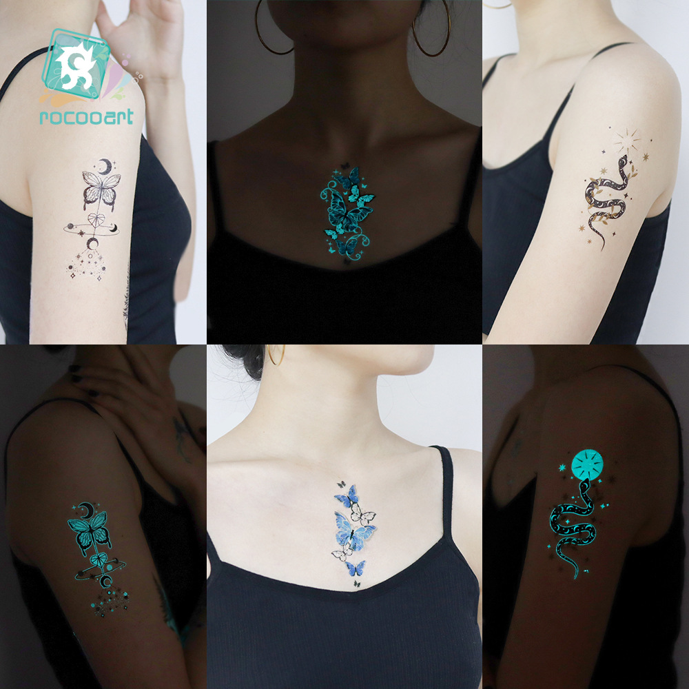 Nuevo azul transfronterizo impermeable luminoso tatuaje pegatinas Festival de Música fiesta brillante serpiente mariposa cara pegatinas tatuaje