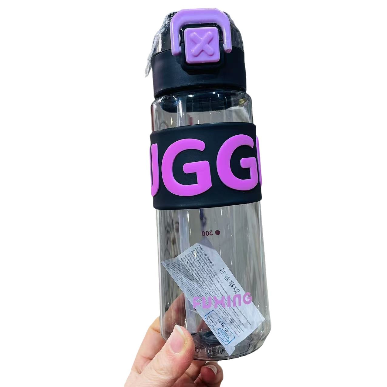 Jinshi 2024 nuevo estilo de taza de agua de plástico de 700ml de gran capacidad con revestimiento de silicona taza de paja fábrica al por mayor