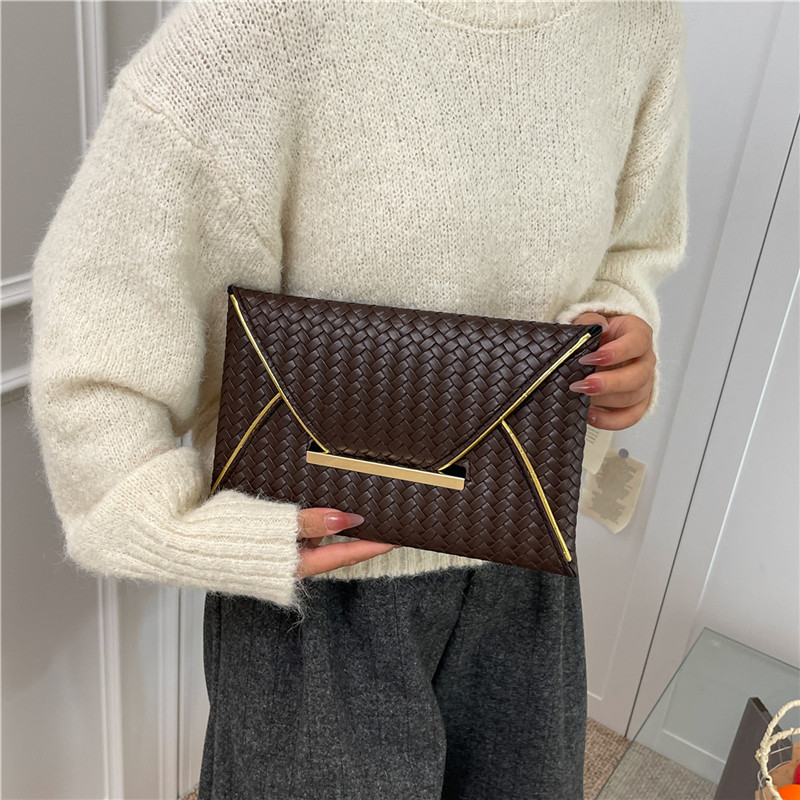 Simple color sólido popular de alto rendimiento sobre de sensación de mujer cena temperamento ligero lujoso moda bolsa de mano casual