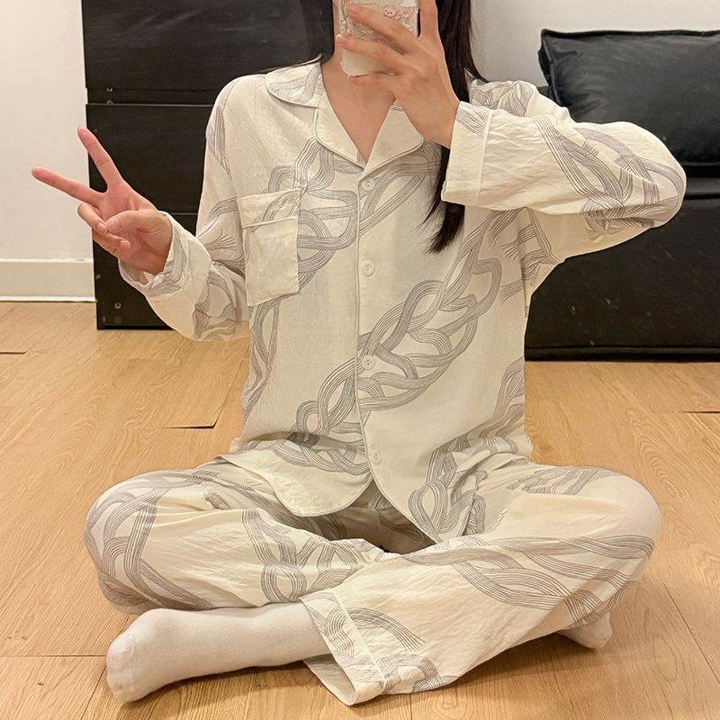 Venta al por mayor transfronteriza otoño nuevo estilo nube pantalones de algodón pijamas de manga larga mujer dibujos animados dulce lazo solapa servicio a domicilio