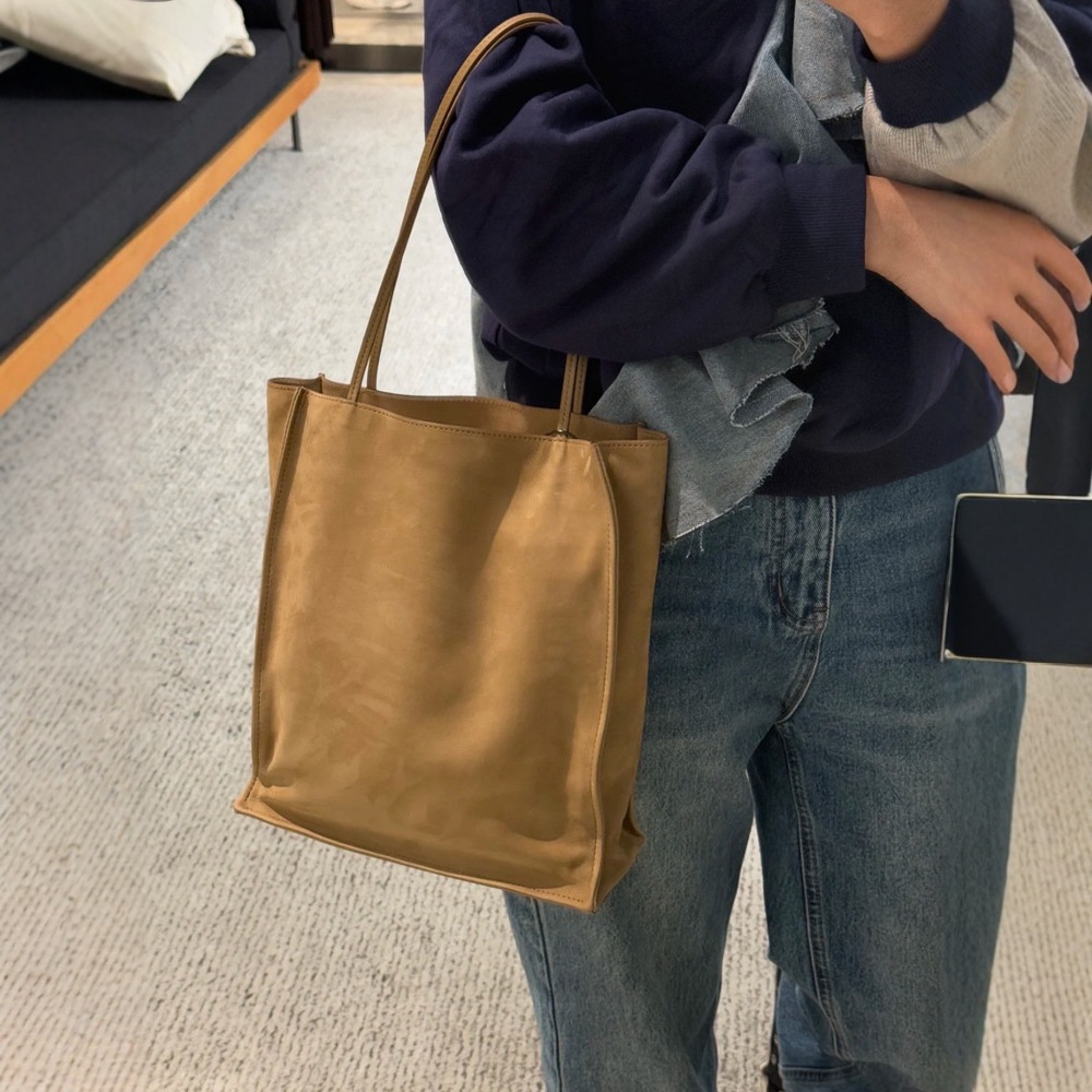 The Ro 2025 New Suede-Texture Cowhide Bag Luxury Niche Fashion Simple Women's Handheld Tote Bag