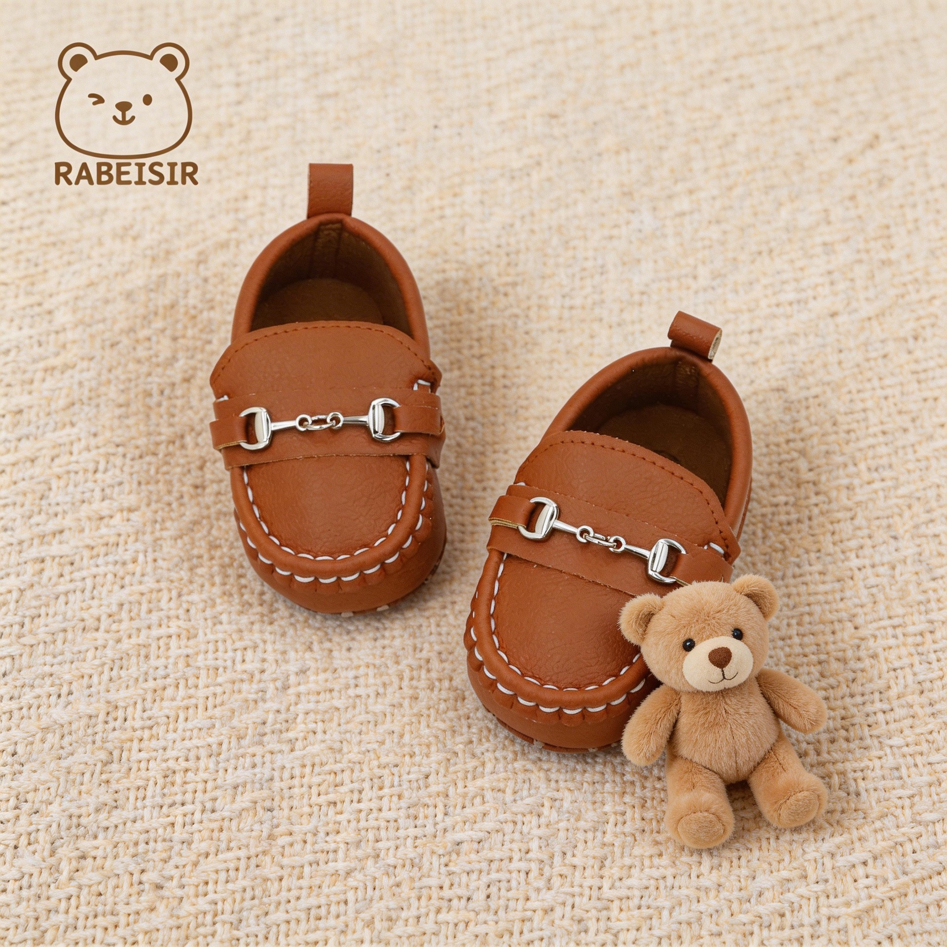 Zapatos de bebé populares de marca transfronteriza para primavera y otoño, zapatos antideslizantes ligeros para primeros pasos, mocasines con cadena pequeña.