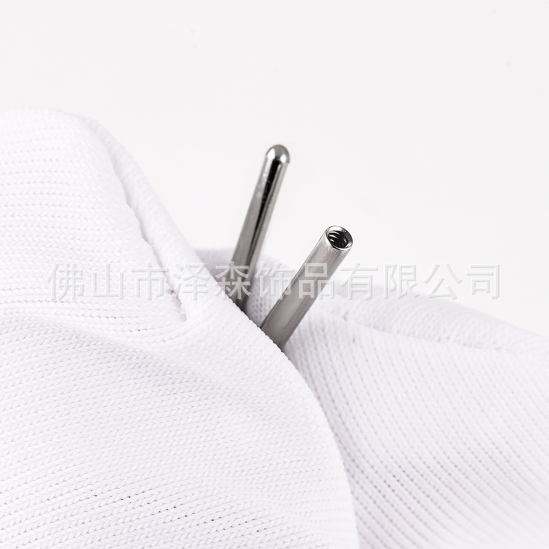 Silver pointed spike labret stud material detail