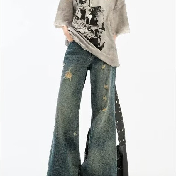 High-Waisted Loose-Fitting Women's Designer Jeans with Unique Irregular Design, Wide-Leg Flared Jeans with Ripped and Worn Details High-Waisted Loose-Fitting Women's Designer Jeans with Unique Irregular Design, Wide-Leg Flared Jeans with Ripped and Worn Details