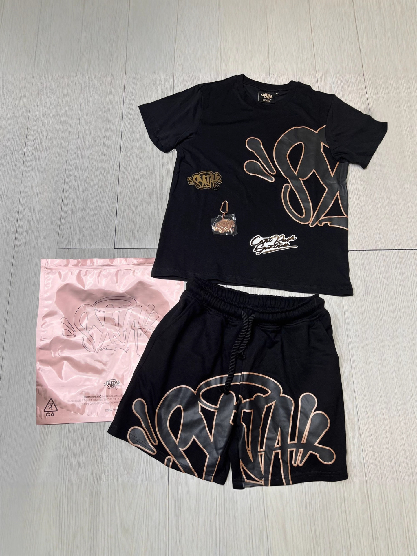 Alta calidad Syna World Hip Hop espuma impresión de manga corta camiseta casual suelta pantalones cortos Syna set