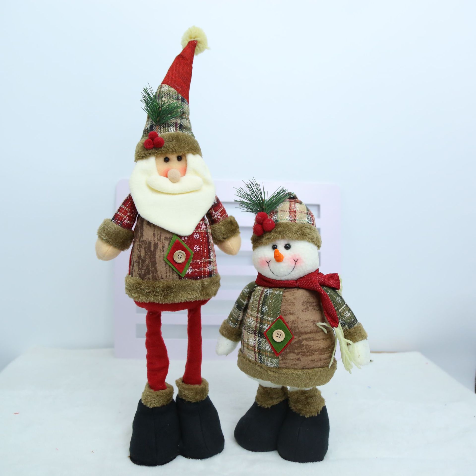 Navidad transfronteriza europea y americana rural retro tejido retráctil piernas viejos muñecas de nieve muñecas de alce adornos juguetes de peluche