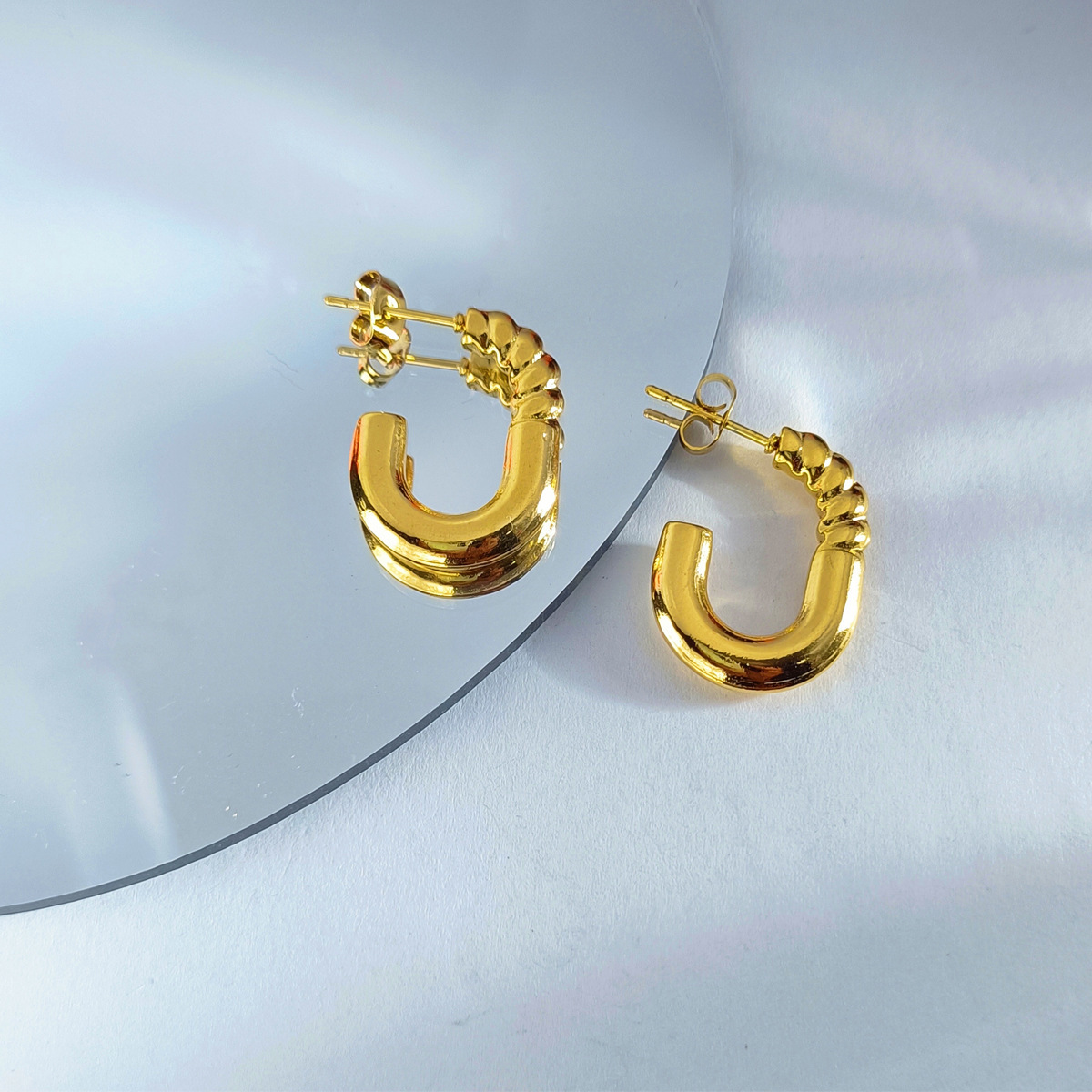 Cross-border best-selling oil-pressure stainless steel hollow earrings from Europe and America, high-end, trendy and light luxury style, 18K earrings wholesale 37 undefined