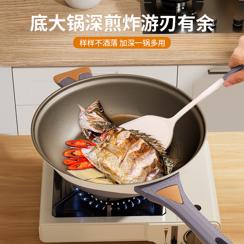 La nueva sartén antiadherente de titanio de dos colores para el hogar 0 olla de micropresión recubierta de flúor estufa general wok wok wok wok al por mayor