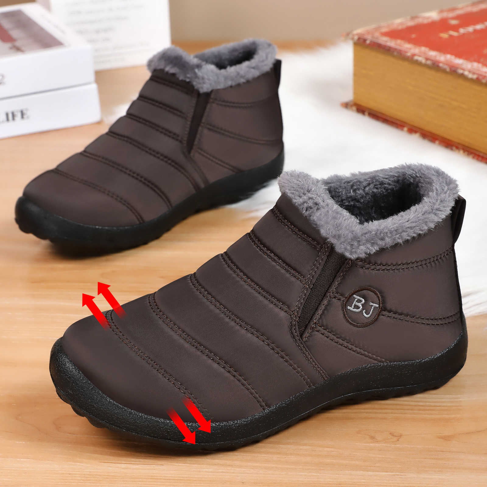 Zapatos de algodón para parejas transfronterizas botas de nieve de tamaño grande botas de algodón gruesas botas de poliuretano calentadas botas cortas a prueba de frío zapatos de mujer