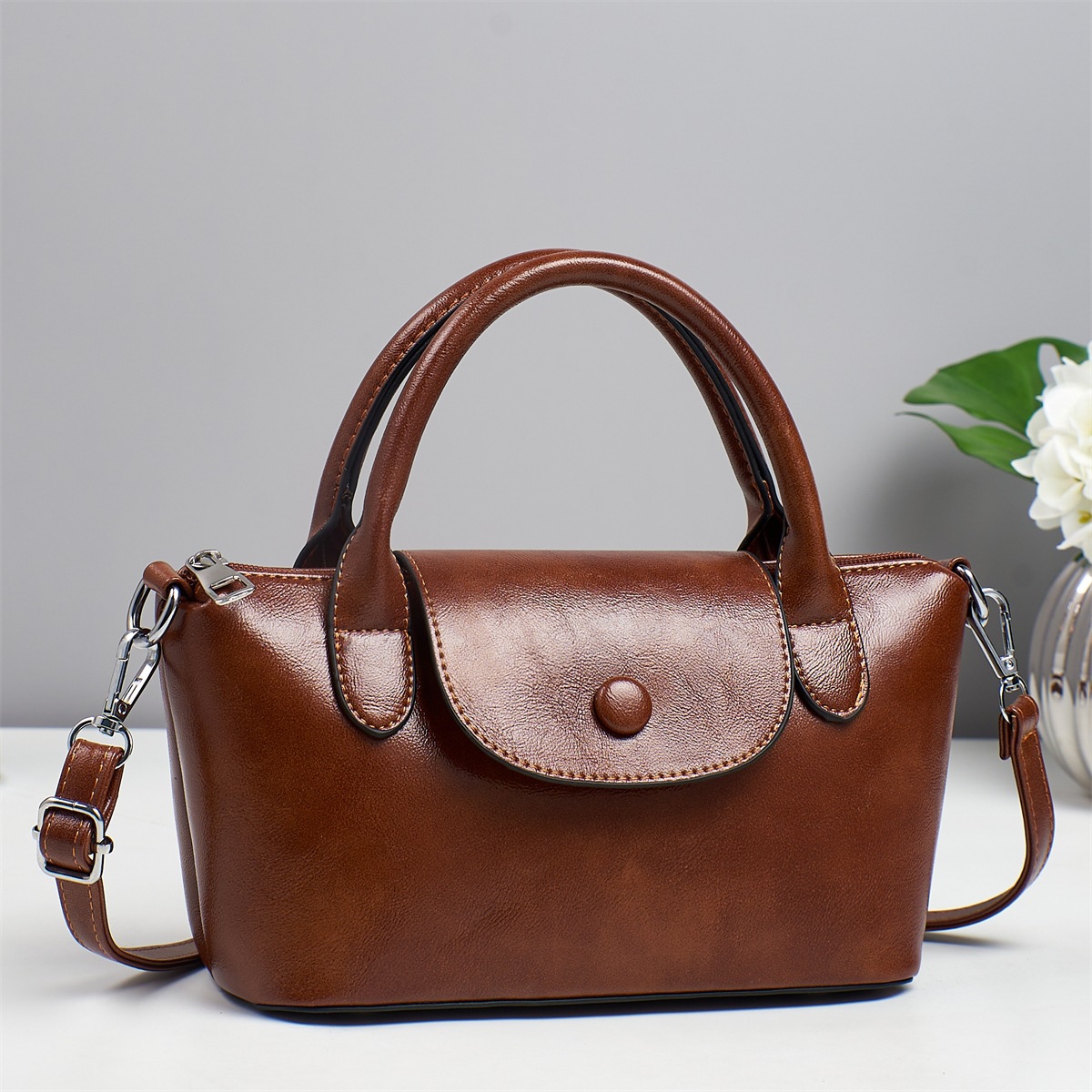 Bolsos para mujer 2025 nuevo bolso de cuero para mujer, bolso de mensajero de todo fósforo de moda de alta gama, bolso de hombro portátil de cercanías de nicho