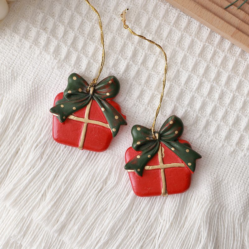 Buscando madera pequeño viejo muñeco de nieve colgante mini resina accesorios de paquete de regalo decoración de Navidad colgante micro paisaje