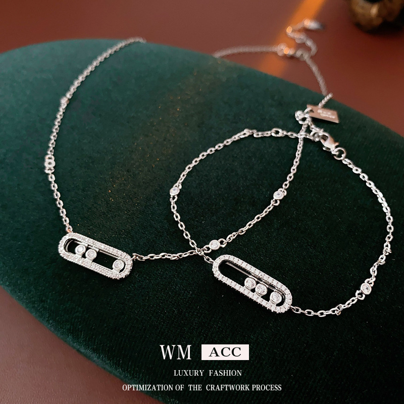 Zircon hueco deslizante collar elíptico ligero lujo frío viento delicado pulsera alta sensación de moda conjunto de joyería mujer