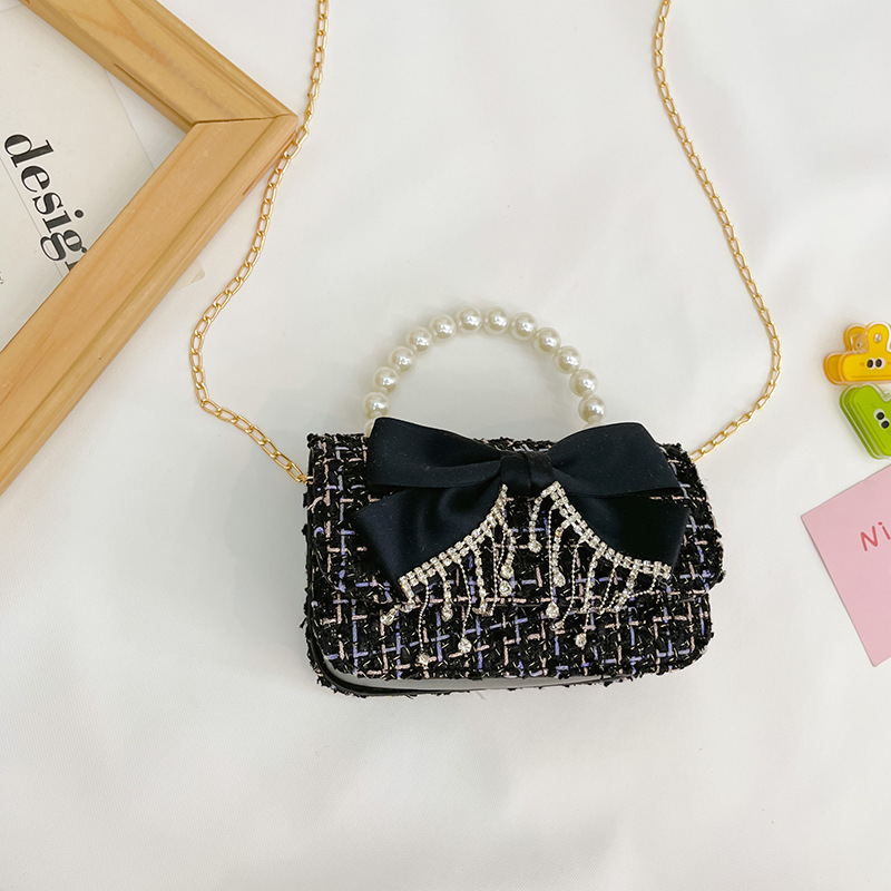 2025 nueva versión coreana de lana de lana, algodón, lino, niños, lazo, perlas, accesorios portátiles, bolsos, bolsos, bolsos de mujer