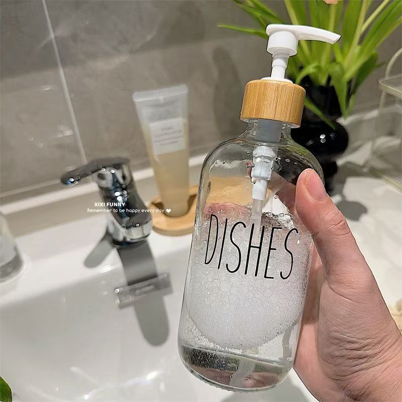 Gran volumen de vidrio nórdico envasado botellas vacías de baño desinfectante de manos gel de baño champú de presión en el lavabo de aire