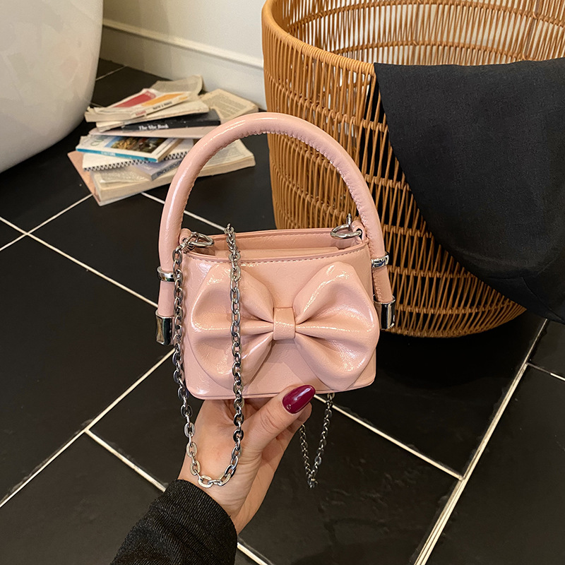 Mini lindos bolsos de mano para niños 2026 nuevo arco de moda infantil interesante lindos bolsos de hombro