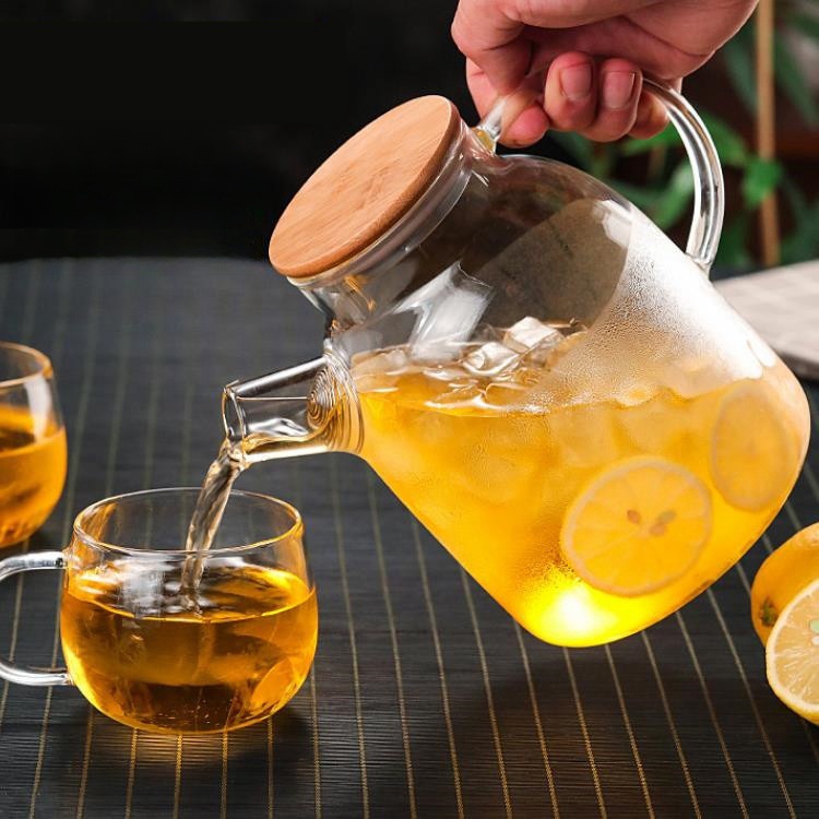 Botella de agua fría de jugo de vidrio con alto contenido de borosilicato Botella de agua fría con tapa de acero de bambú de gran capacidad Botella de agua fría de vidrio transparente