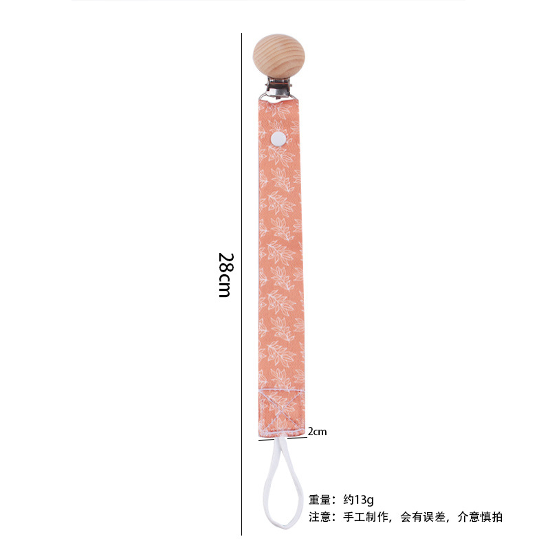 Nuevos productos para bebés creativos de cabeza redonda abrazadera de chupeta de beech desmontable larga cadena de chupeta de tela