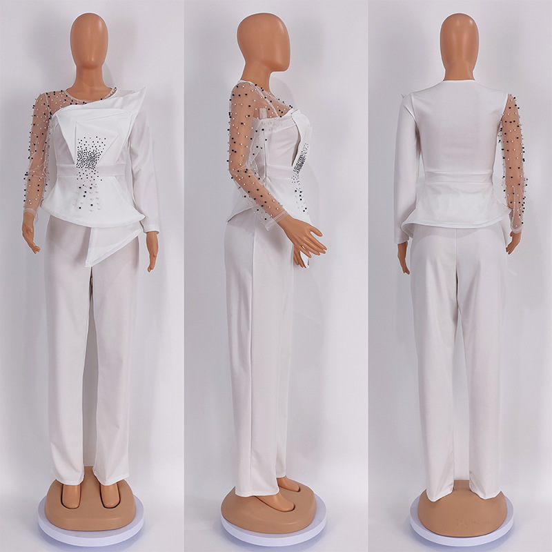 Completo pantalone donna taglie forti con dettagli in mesh e perle_voghion.com