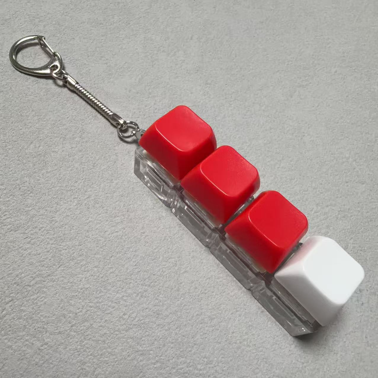 Four-button transparent case - red, red, red, white