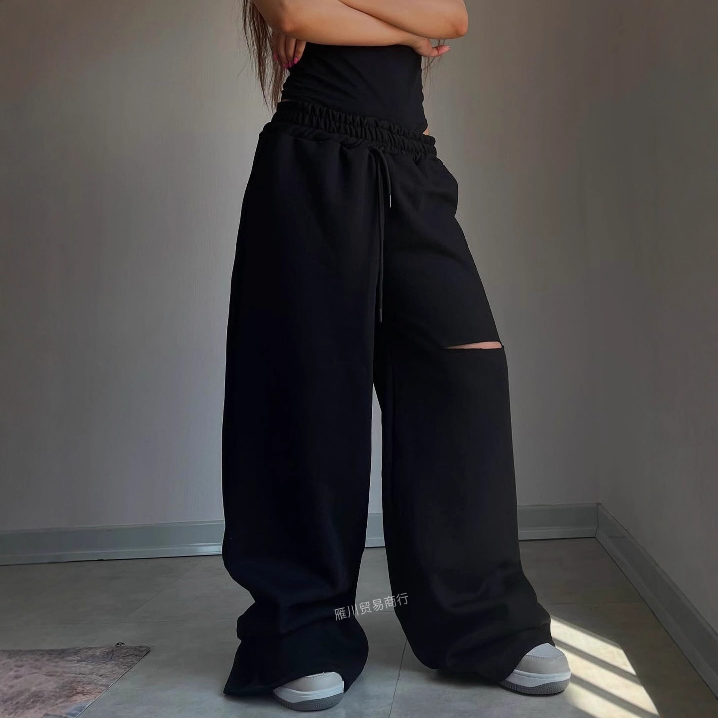 Pantalones casuales deportivos de otoño y invierno transfronterizos agujeros rectos y sueltos, pantalones de cintura alta y delgados, pantalones de piernas anchas