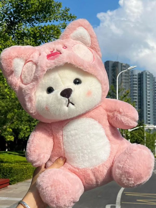 15インチのリナ熊公仔のぬいぐるみが女の子に寝て枕を抱いて十五インチの両替人形をプレゼントします。|undefined