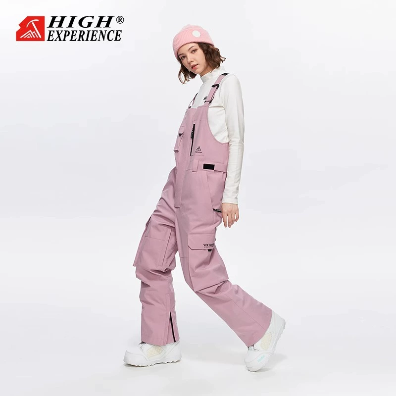 Зимний лыжный комбинезон для женщин, водонепроницаемый, ветрозащитный, теплый, свободного кроя, унисекс, с цветовыми блоками, профессиональный цельный костюм для сноуборда, нишевый стиль.