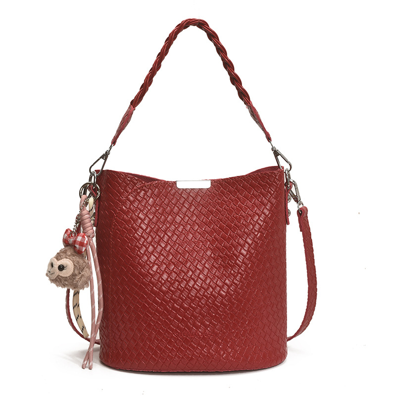 Bolso de moda bolso de axila de gran capacidad 2025 nuevo bolso de hombro de tendencia bolso de mensajero de todo fósforo bolso de cubo de color sólido