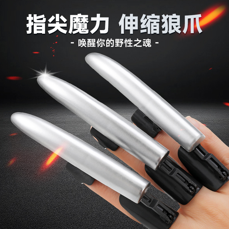 La explosión de sonido de la garra de lobo se puede plegar enlaces de eyección dedos retráctiles garra de lobo creativa novedad juguete de punta de dedo