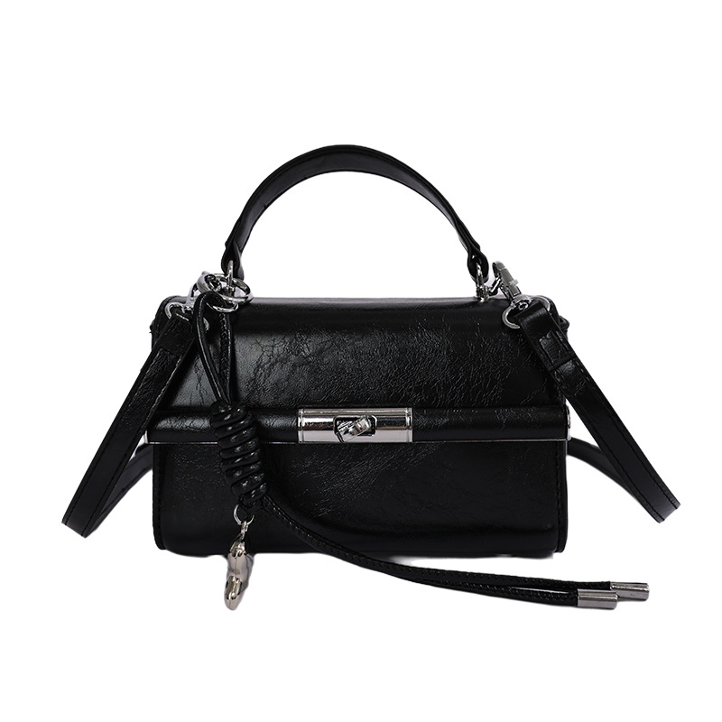 Bolsa de mano transfronteriza para mujeres 2026 nuevo bolso de hombro de verano de alta calidad retro bolso de mano de moda mochila