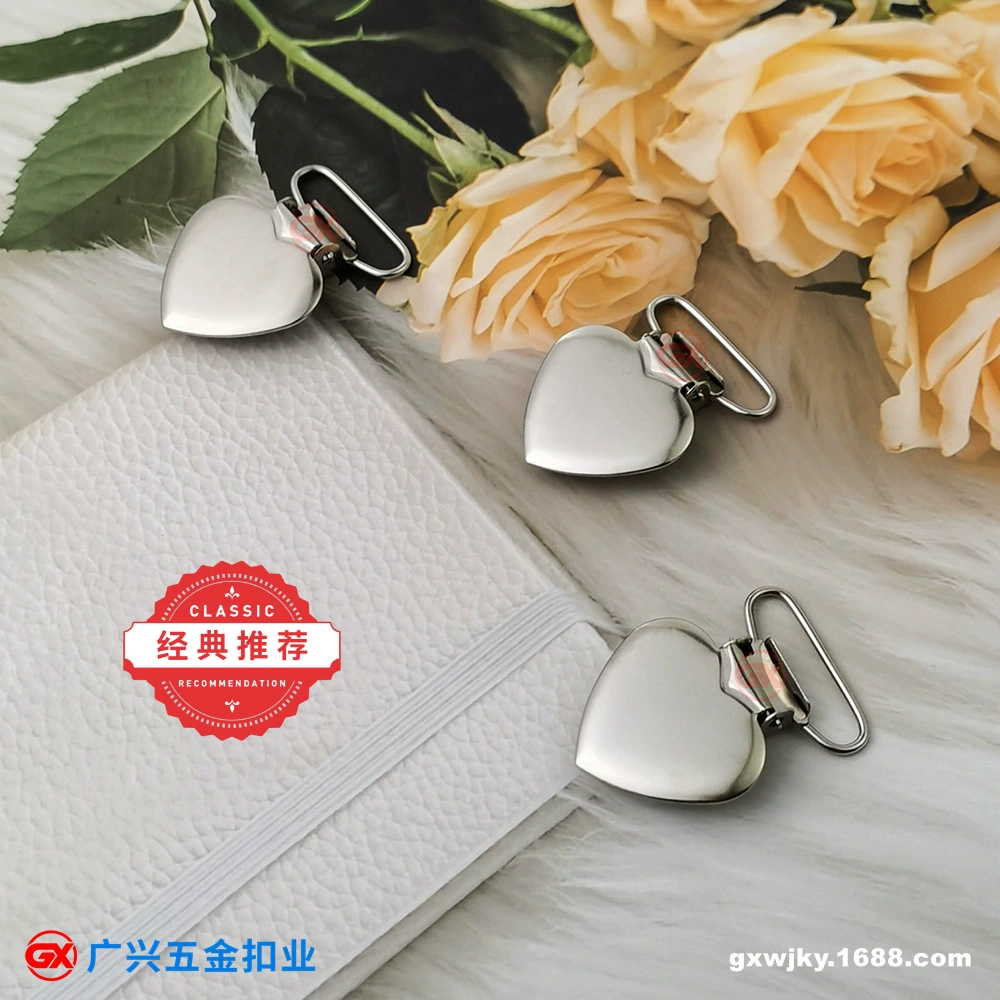 Спот поставляет зажим в форме сердца для соски