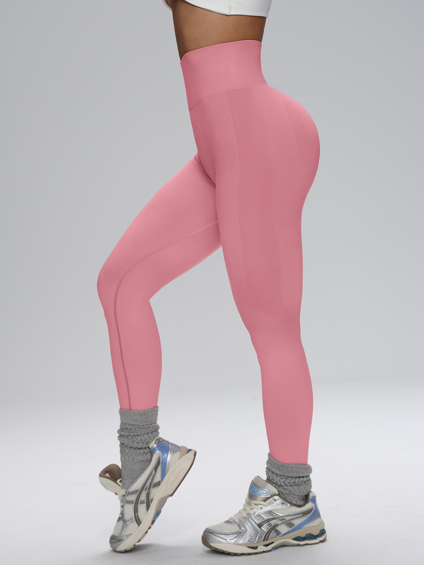 Europa y los Estados Unidos sin costuras cintura alta pantalon de gimnasio de alta cadera para mujeres corriendo al aire libre apertado nueve pantalones de pelusa de miel
