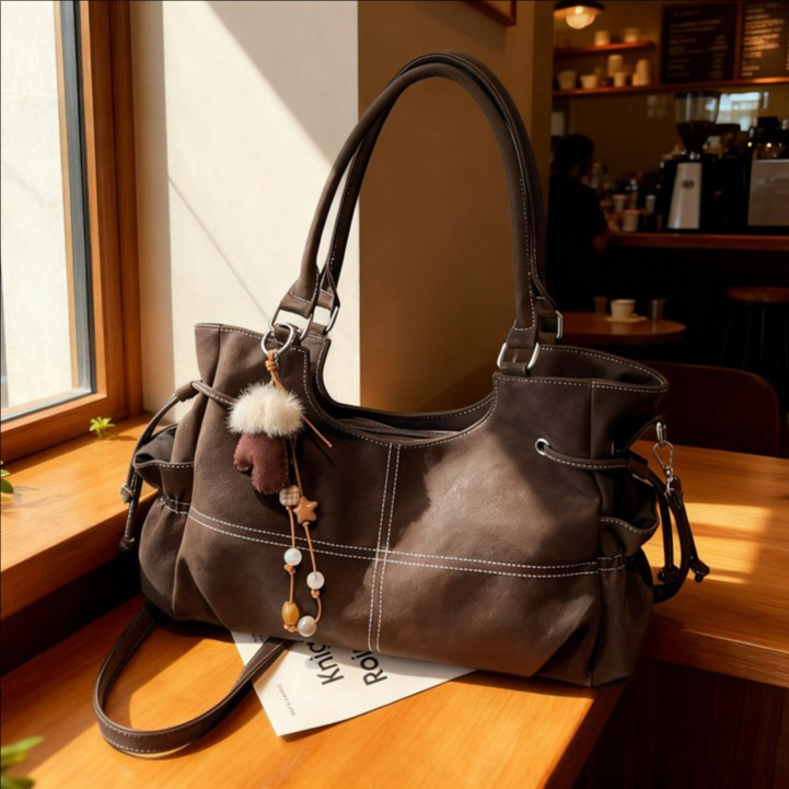 Retro nicho locomotora viento bolso otoño invierno 2025 nuevo sentido de alta calidad de viaje de hombro bajo la braza bolso de mujer